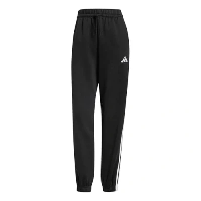 Image of adidas Sportswear Essentials Stripes Loose Tracksuit bottoms, Women&#039;s, Size: XXS, Black/white