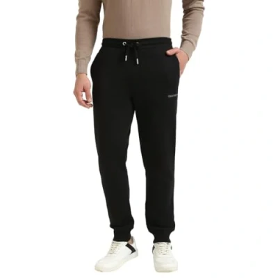 Image of Calvin Klein Jeans Monologo Tracksuit bottoms, Men&#039;s, Size: Small, Black