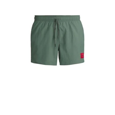Image of HUGO Dominica Swimming shorts, Men&#039;s, Size: Medium, Open green
