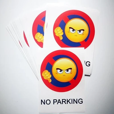 Image of DIRODISTRIB 10 hard to remove No parking stickers. sign