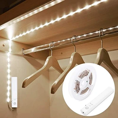 Image of OriFiil Motion Sensor Wardrobe Light, 1.5M LED Strip Lights Night 6000K Cold White, Auto on/Off, Battery Powered for Closet, Cabinet, Kitchen, Stairs, Under Bed Indoor Lighting