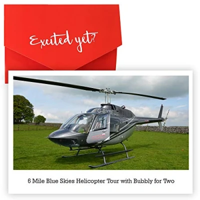 Image of Red Letter Days 6 Mile Blue Skies Helicopter Tour with Bubbly for two take in breathtaking views a glass of fizz people at locations UK wide