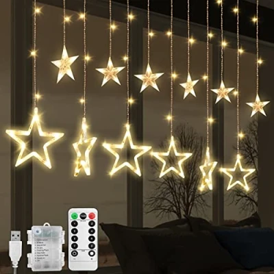 Image of Jsdoin Christmas LED Stars Curtain Lights,12 138 Window String Lights with 8 Flashing Modes Decoration for Wedding, Party,Wall, Home Decorations,USB/Battery Powered (A Warm White)