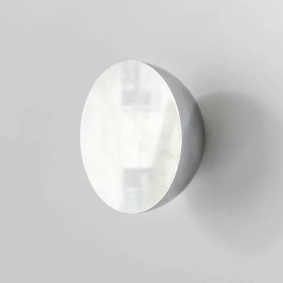 Image of New Works wall mirror Aura Small, Ø 10 cm, stainless steel
