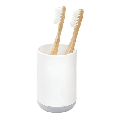 Image of iDesign 28532 Cade Toothbrush Holder, Round Plastic Stand for Regular and Electric Toothbrushes, White, 7.6 cm x 11.4