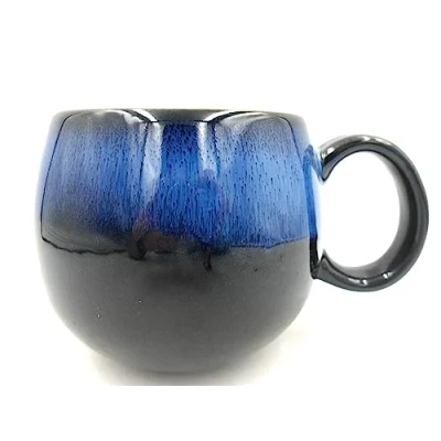 Image of Reactive Glaze Stoneware Studio Sphere Mug in Sapphire Blue and Ink Black.