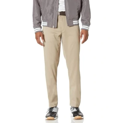Image of Amazon Essentials Men&#039;s Slim Fit Stretch Golf Trousers, Khaki Brown, 33W / 28L