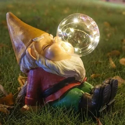 Image of THE ENCHANTED Garden Gnome Bubble Blowing Statue Sitting Outdoor Resin Figurine Solar Powered LED Lights for Patio Lawn Yard Décor (RP010)