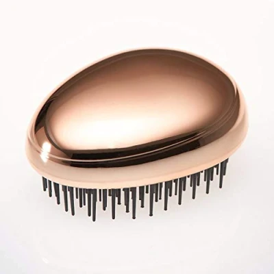 Image of Kent Brushes Rose Gold Travel Hairbrush.