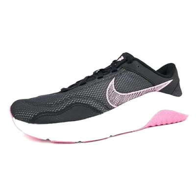 Image of Nike Women&#039;s Legend Essential 3 Sneaker, Black/Pinksicle Particle Grey, 3.5 UK