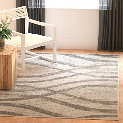 Image of SAFAVIEH Modern Wave Distressed Rug for Living Room, Dining Bedroom Adirondack Collection, Short Pile, in Cream and Grey, 91 X 152 cm