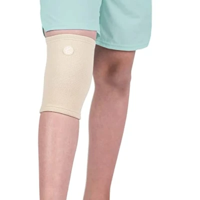 Image of KARM Kids Knee Support Sleeve Childs Compression for Children Girls &amp; Boys Junior Sports Football Joint Pain Conditions (Beige)