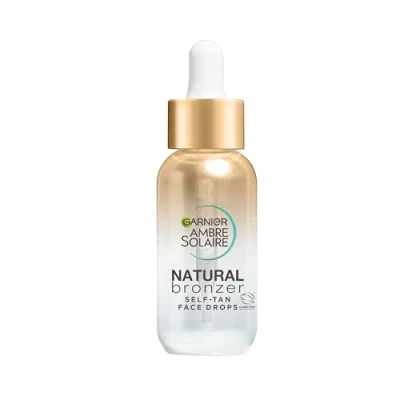 Image of Garnier Ambre Solaire Natural Bronzer, Self Tan Drops for Face, Hyaluronic Acid &amp; Coconut Water, Tailor Made Glow, Gradual Fake Tan, Approved by Cruelty Free International, Vegan, 30ml