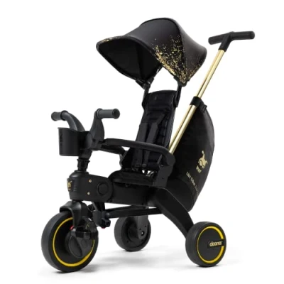 Image of DOONA Liki Baby Trike S5 Premium Limited Edition Golden Foldable Toddler Tricycle with parent handle for ages 10 Months to 3 Years