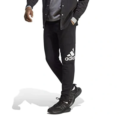Image of adidas Men&#039;s Essentials French Terry Tapered Cuff Logo Pants, Medium Grey Heather, XXL Short