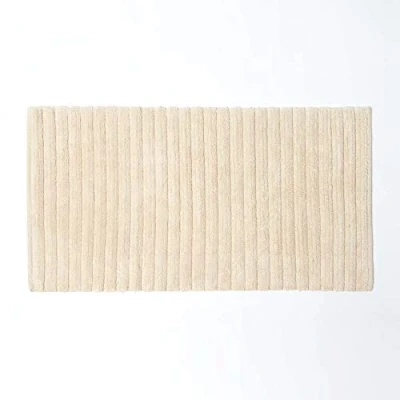 Image of HOMESCAPES Cotton Ribbed Spa Style Cream Bath Mat, 100% Ultra Absorbent, Washable at Home