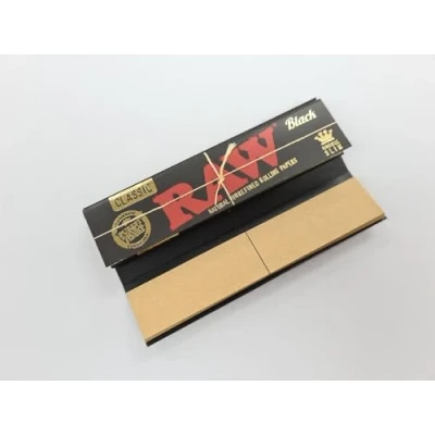 Image of RAW Black Connoisseur with Roach Tips King Size Slim Hand Rolling Papers Tobacco (1)
