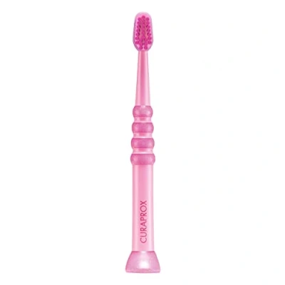 Image of Curaprox Baby Toothbrush First for Babies with 4260 Extra Soft Curen bristles and Small Rubberised Head The Teeth Pink