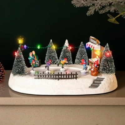 Image of Home Zone Traditional Festive Christmas Village Ice Rink Scene with Multi Colour LED Lights Battery Operated Ornaments Songs Music Function Light Up Xmas Indoor Decorations