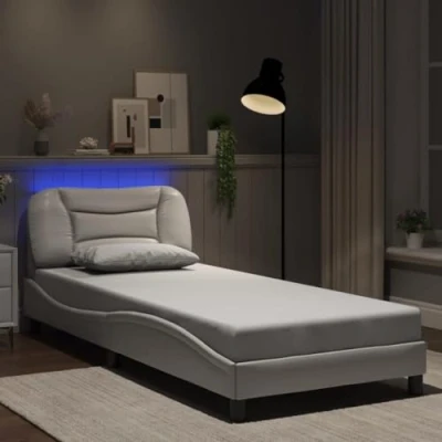 Image of vidaXL Single Bed Frame with LED Lights White Faux Leather, 90x190 cm, Plywood Slats, Supportive Headboard, Stylish Wave Design