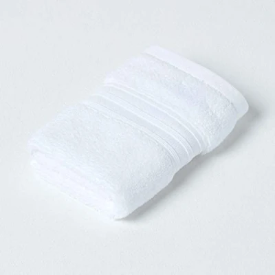 Image of HOMESCAPES Luxury White Soft 100% Supima Cotton Face Cloth Zero Twist Super Absorbent &amp; Fluffy 550 GSM Thick Plain Flannel Wash