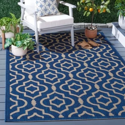 Image of SAFAVIEH Trellis Rug for Indoor &amp; Outdoor Courtyard Collection, Short Pile, in Navy and Beige color, 160 X 231 cm
