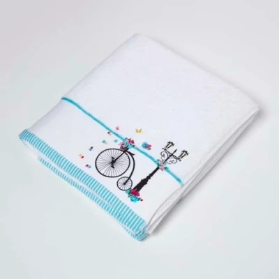 Image of HOMESCAPES 100% Turkish Cotton &#039;Vintage Bike&#039; White Bath Sheet Black Silhouette Bike and Flowers