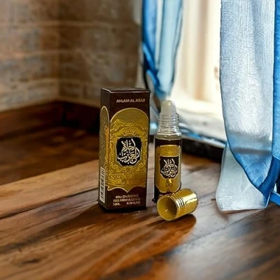 Image of Ahlam Al Arab 10ml Roll on Perfume an amazing combination of citrus notes and oriental woody notes.Hafsa Arabian Fragrances Ltd