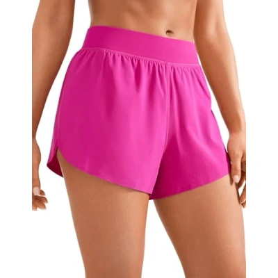 Image of CRZ YOGA Women&#039;s Mid Waisted Running Shorts Side Split Quick Dry Sports Lightweight Gym with Liner Hibiscus Purple 16