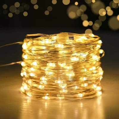 Image of iJiGui 10M Fairy Lights, 100 LED String Lights Copper Wire Light, Battery Operated for Indoor Outdoor Lighting, Party, Wedding, Christmas, Room Decorations (Warm White)