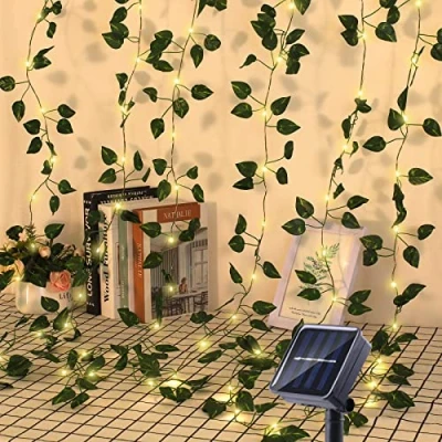 Image of GuKKK Outdoor Solar Fairy Lights, Artificial Ivy 100 LEDs, 10 m/32 ft, 8 Modes, Waterproof Lights for Garden, Balcony, Wedding, Fence, Camping, Christmas, Decor (Warm White), Green Leaf