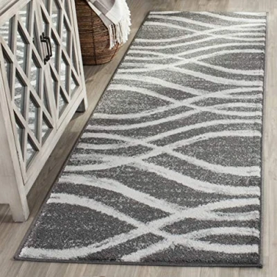 Image of SAFAVIEH Modern Wave Distressed Rug for Living Room, Dining Bedroom Adirondack Collection, Short Pile, in Charcoal and Ivory, 76 X 244 cm