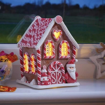 Image of 20cm Battery Operated LED Gingerbread Santa Candy Cabin Christmas Decoration
