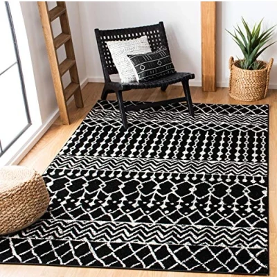 Image of SAFAVIEH Boho Chic Rug for Living Room, Dining Bedroom Tulum Collection, Short Pile, in Black and Ivory, 91 X 152 cm