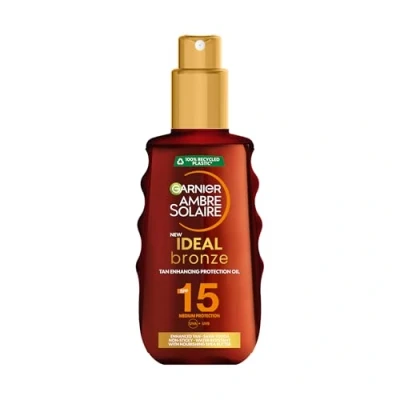 Image of Garnier Ambre Solaire Ideal Bronze Protective Oil Sun Cream SPF15, High Protection Factor 15, Shea Butter, Water Resistant &amp; Non Greasy Sunscreen, UVA UVB Protection, 150ml