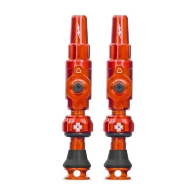 Image of Muc Off Big Bore Lite Tubeless Valves, Orange 30mm Precision Engineered Dust Caps for Bikes with Revolutionary Airflow Technology Presta Valve MTB/Road/Gravel