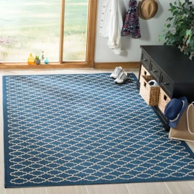 Image of SAFAVIEH Trellis Rug for Indoor &amp; Outdoor Courtyard Collection, Short Pile, in Navy and Beige color, 122 X 170 cm