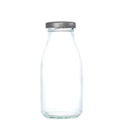 Image of 250ml Small Glass Milk Bottle, Mini Bottle with Silver Caps for Milk, Sweets, Gifts, Juice &amp; Cocktails (Transparent, Pack of 24)