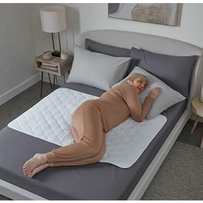 Image of Waterproof bed pad by GuardedSleep Premium quality washable wetting sheet for adults or children with incontinence Suitable double and single size beds Slip resistant