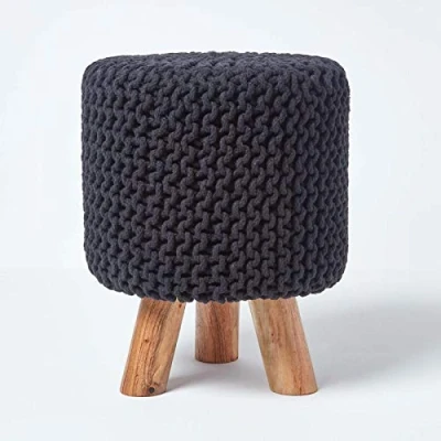 Image of HOMESCAPES Black Cotton Knitted Pouffe Footstool with Wooden Legs 32 x 42 cm