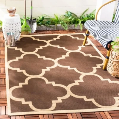 Image of SAFAVIEH Trellis Rug for Indoor &amp; Outdoor Courtyard Collection, Short Pile, in Dark Brown color, 160 X 231 cm