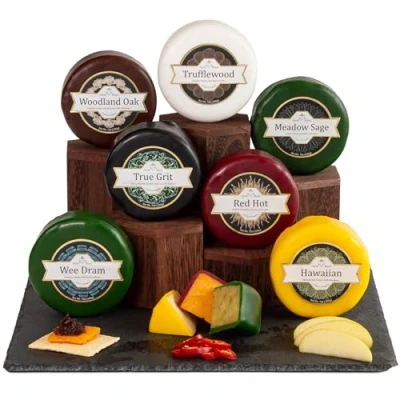 Image of InterCheese 7 Cheese Truckle Hamper Gift Selection Artisan Truckles of Mature and Oak Smoked Cheddar, Wensleydale, Double Gloucester Derby Cheeses sent nestled in Wood Wool