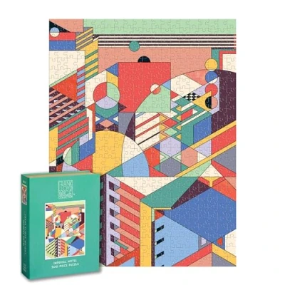 Image of Galison Frank Lloyd Wright Imperial Hotel 500 Piece Book Puzzle Featuring Tokyo Geometric Pattern Artwork Packaged in Magnetic Keepsake Sized Box