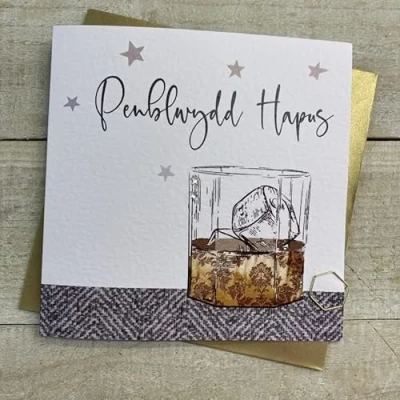 Image of WHITE COTTON CARDS PENBLYDD HAPUS WELSH BIRTHDAY CARD WHISKEY GLASS. HANDMADE (W S189)