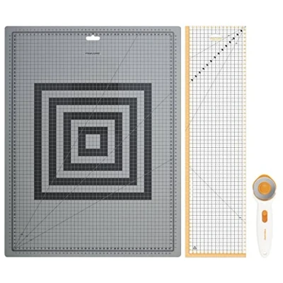 Image of Fiskars Sewing Starter Kit, Rotary Cutter with Diameter 45 mm, Self Healing A2 Cutting Mat (45 x 60 cm / 18 24 inches), Patchwork Ruler (15 cm), 3 Pieces, 1066046