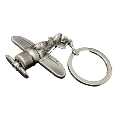Image of Fat catz copy Silver colour solid metal Aeroplane Jet Plane moving propellor enamel keyring gift