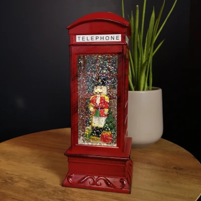 Image of 27cm LED Christmas Glitter Water Spinner Red Telephone Box with Speaking Nutcracker Scene