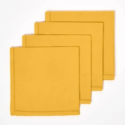 Image of HOMESCAPES Four Mustard Yellow Napkins 100% Cotton 18 x Inch (45 45 cm) Easy care table Hand Woven Machine Washable