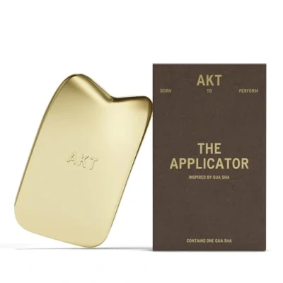 Image of AKT, THE APPLICATOR. Inspired by GUA SHA for improved micro circulation. 100% PLASTIC FREE — Made from premium quality brass. Use to apply your AKT NATURAL DEODORANT BALM