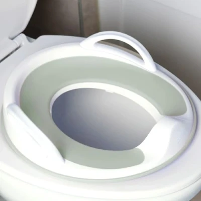 Image of Jool Baby Potty Training Seat for Boys and Girls with Handles, Fits Round &amp; Oval Toilets, Non Slip Splash Guard, Includes Free Storage Hook (Sage)